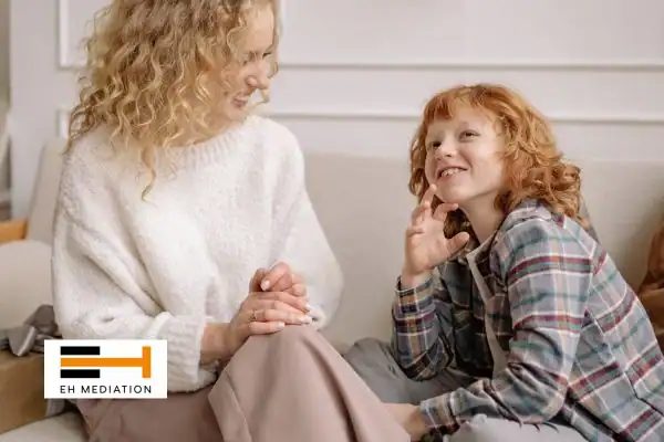 Happy mother and child after sorting child arrangements mediation Truro